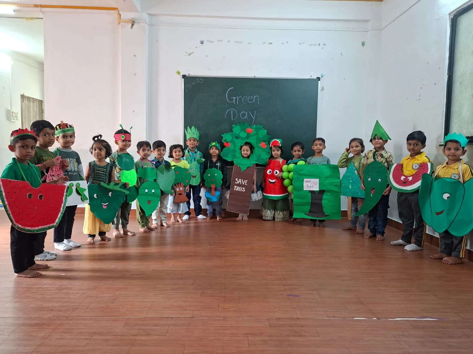 Preschool children reading books in classroom
